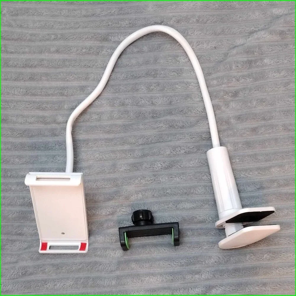 Very stiff clamp style device holder with interchangeable brackets